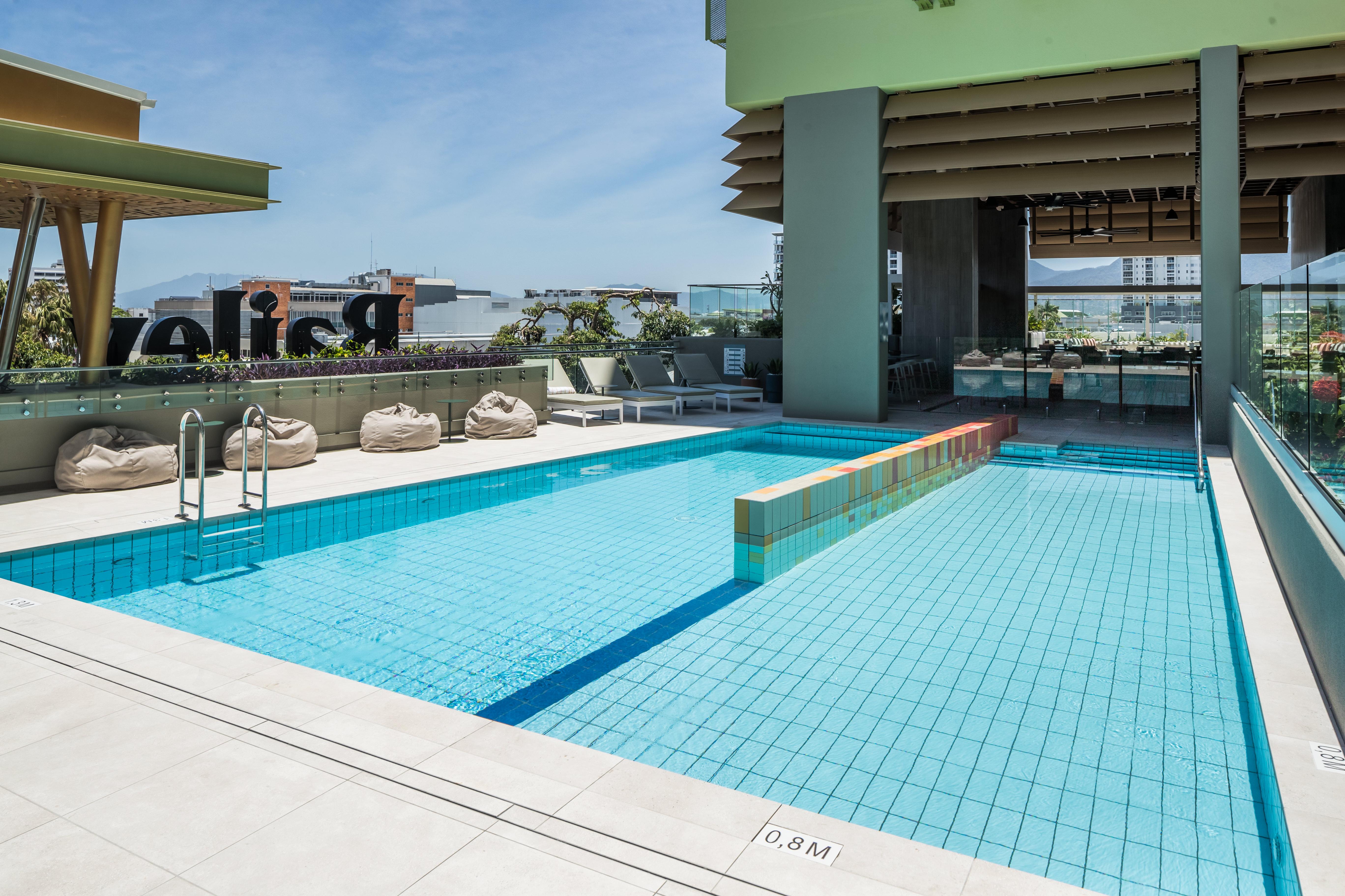 Crystalbrook Bailey Hotel Cairns Exterior photo The rooftop pool at the hotel