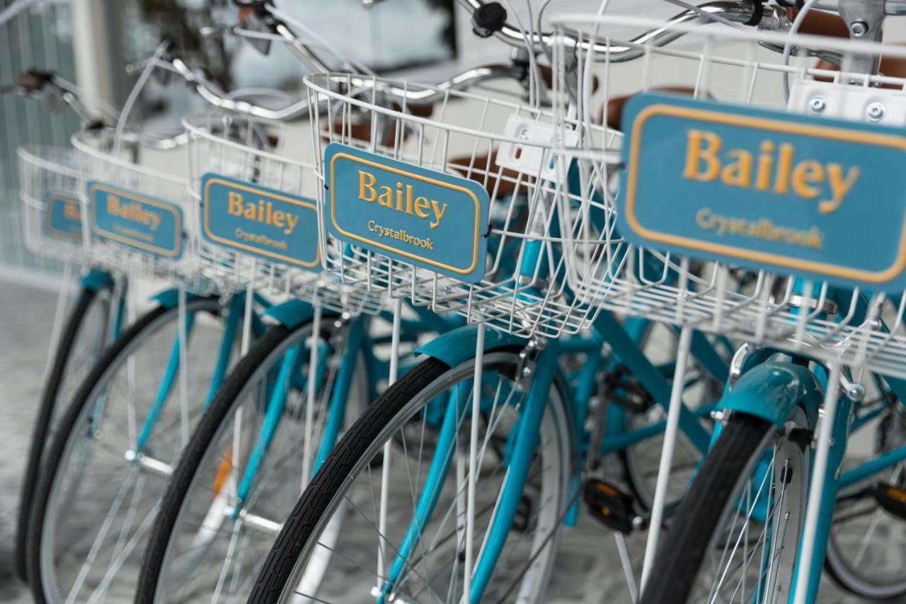 Crystalbrook Bailey Hotel Cairns Exterior photo Bicycles for hire at the station