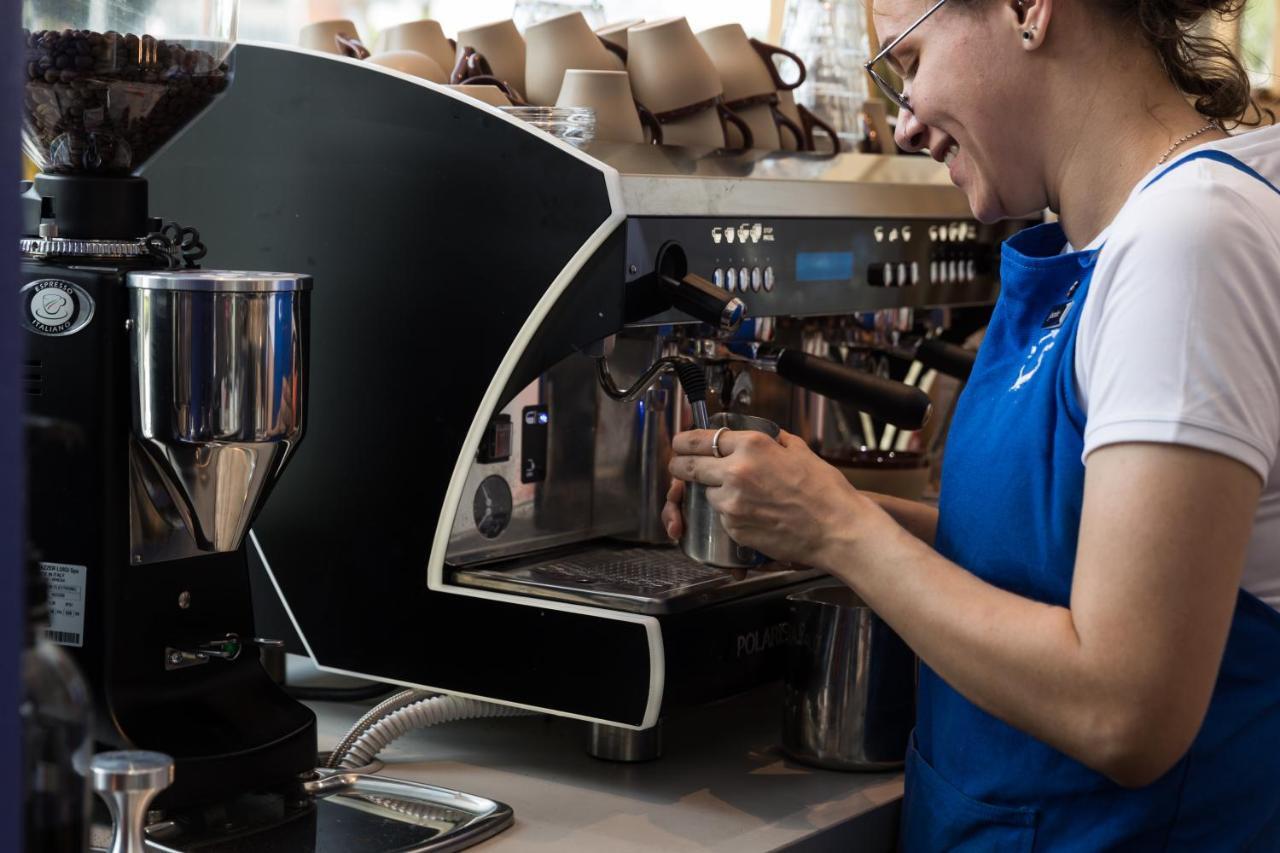 Crystalbrook Bailey Hotel Cairns Exterior photo A barista making coffee